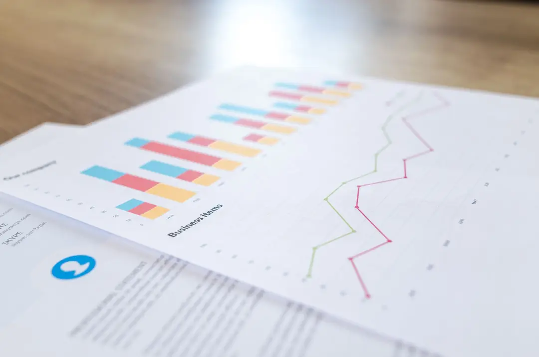 Printed report with charts on a desk